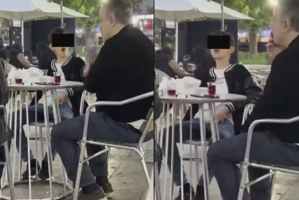 Vahim görüntüler! Küçücük çocuk ailesinin yanında sigara içti, bir de halka çıkardı